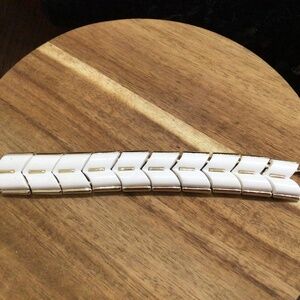 Vintage Coro white bracelet with silver backing. Great shape.